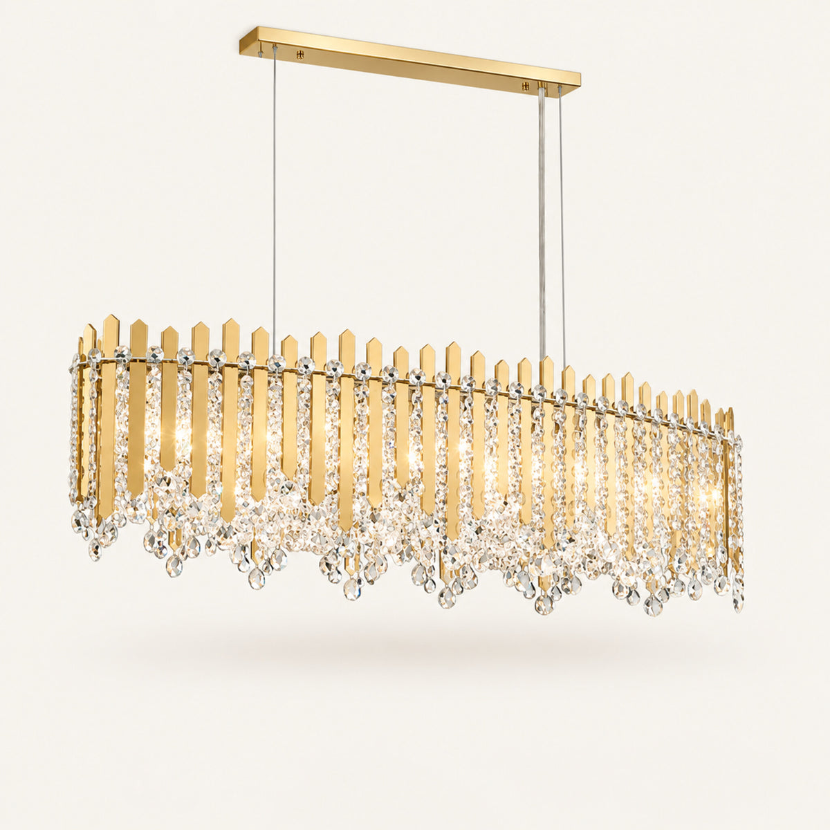 Chatter 12-light linear pendant in gold mirror with clear crystal on a warm ivory background