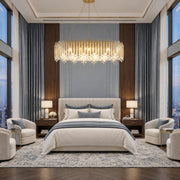 Chatter 12-light linear pendant in gold mirror displayed in a blue-gray transitional bedroom
