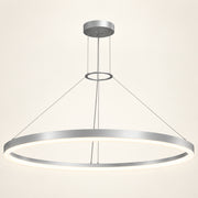 Corona 4 LED ring pendant in bright satin aluminum on a warm ivory background