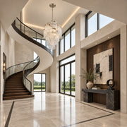 Mont Blanc chandelier in modern silver leaf displayed in a limestone European contemporary foyer