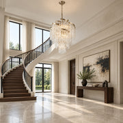 Mont Blanc chandelier in modern silver leaf displayed in a limestone European contemporary foyer