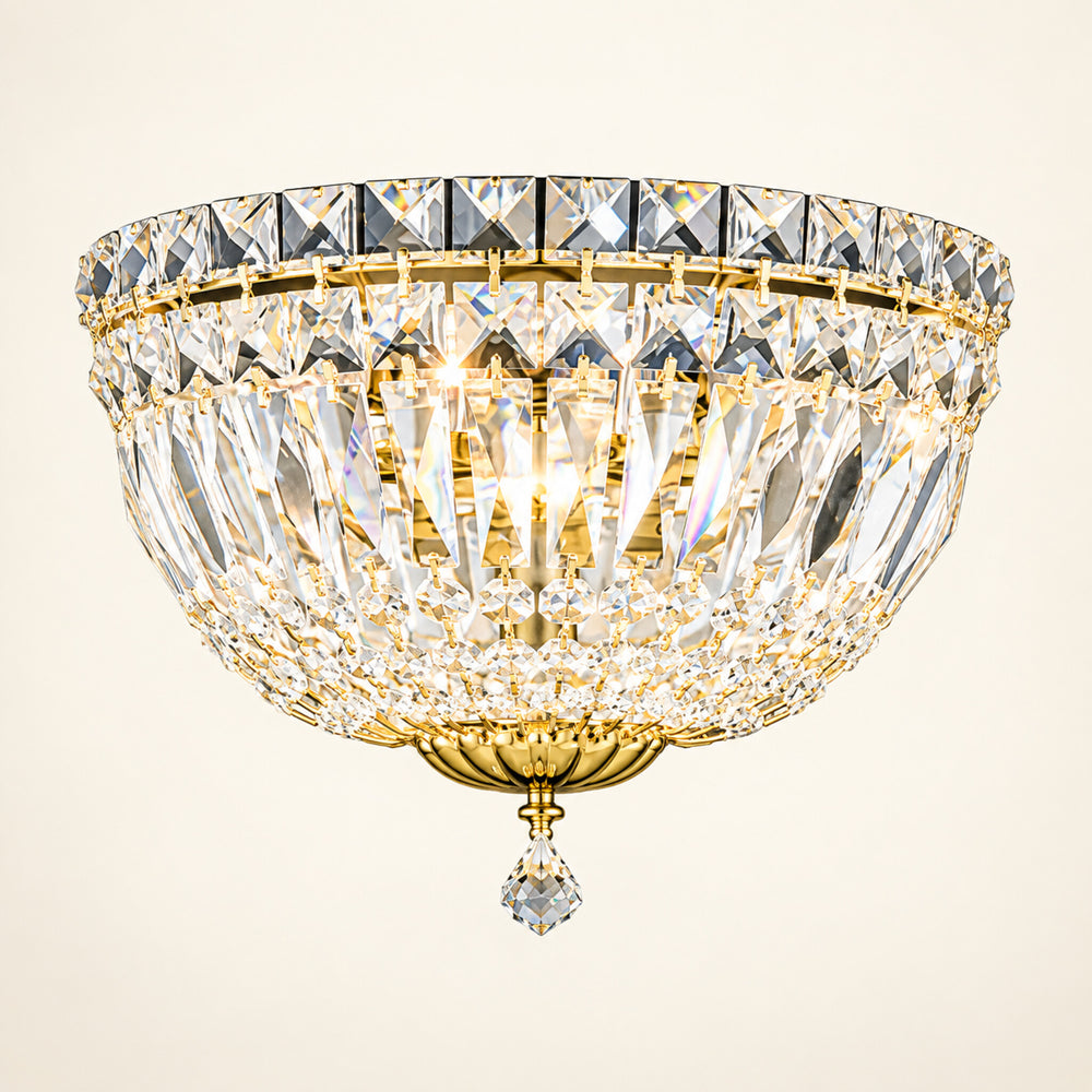 Petit Crystal Deluxe 3-light wall sconce in gold on a warm ivory background