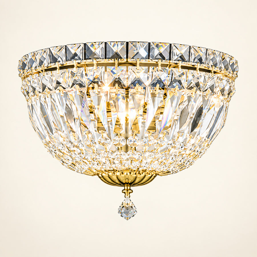 Petit Crystal Deluxe 3-light wall sconce in gold on a warm ivory background