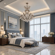 Renaissance Rock Crystal 15-light chandelier in antique pewter displayed in a blue-gray European classic bedroom