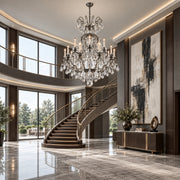 Renaissance Rock Crystal 15-light chandelier in antique pewter displayed in a limestone contemporary grand foyer