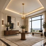 Travis 8-light foyer lantern in aged brass displayed in a limestone and walnut luxury interior